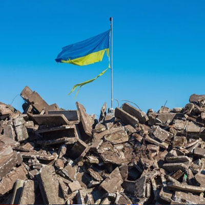 The Ukraine flag flying over rocks