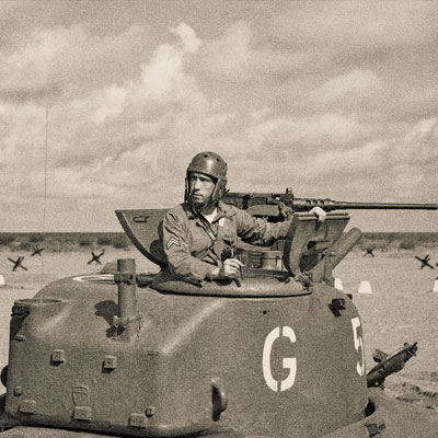 black and white image of soldier in tank