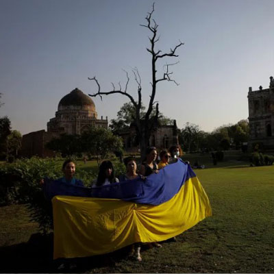 Ukrainians holding the Ukrainian flag in New Dehli