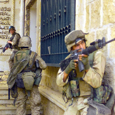 US Marines Corps Marines enter one of Saddam Hussein’s palaces in Baghdad