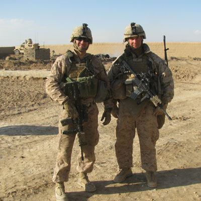 Thaddeus Drake standing next to fellow soldier in Afghanistan
