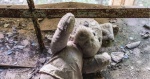 Stuffed animal lying in debris