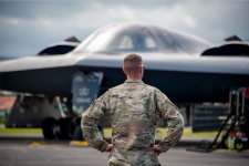 Soldier in Front of A United States Air Force B-2 Spirit Bomber