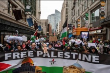 Demonstrators march in support of Palestinians in Boston