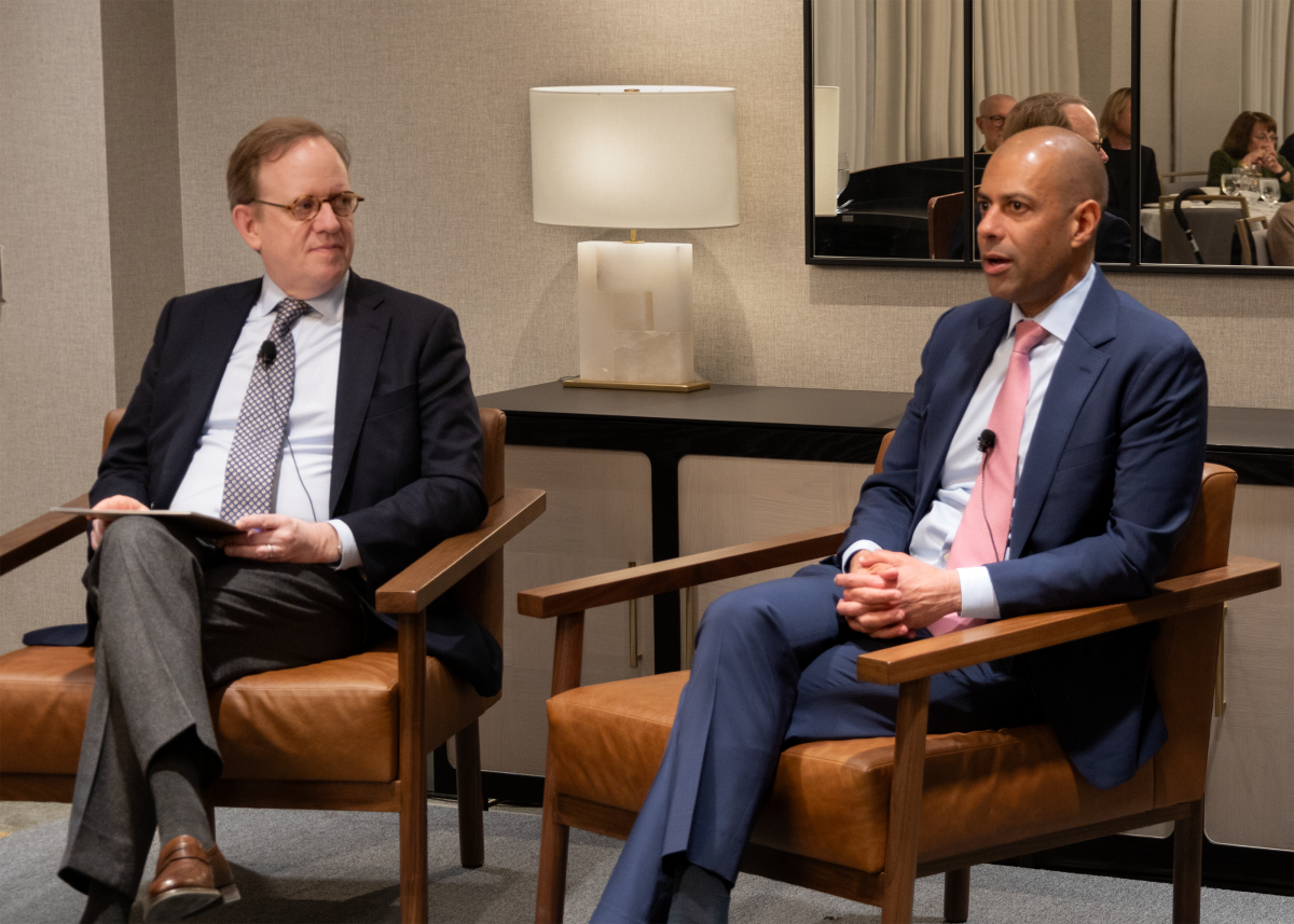 Vipin Narang, right,  speaks as Taylor Fravel looks on.