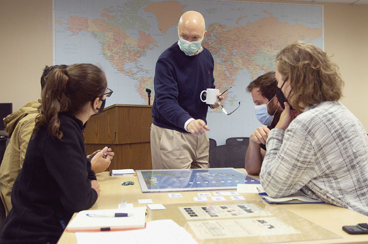 Eric with students inside pye