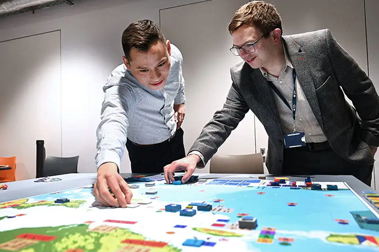 MIT’s Dr Erik Lin-Greenberg (left) and Brunel’s Dr Iain Farquharson (right) during a session of the UK Wargaming Institute