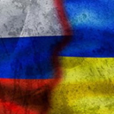 The Ukrainian and Russian flag fading into each other