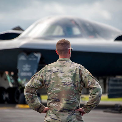 Soldier in Front of A United States Air Force B-2 Spirit Bomber