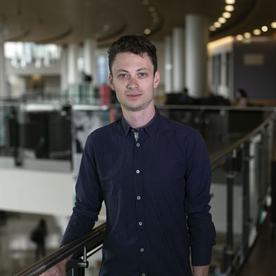 Austin Cooper standing on the second floor of a building