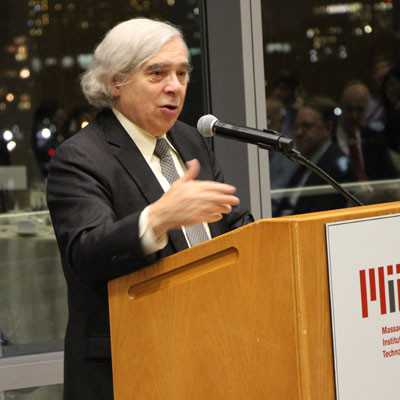  Ernest Moniz at a podium speaking