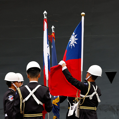 Military honor guards fix Taiwan's flag during Taiwan Navy's open day event for the public at Yilan, Taiwan March 20, 2025. REUTERS/ Ann Wang