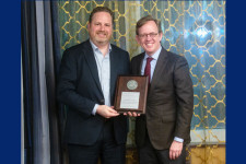 Brian Weeden and Taylor Fravel standing with the award plaque